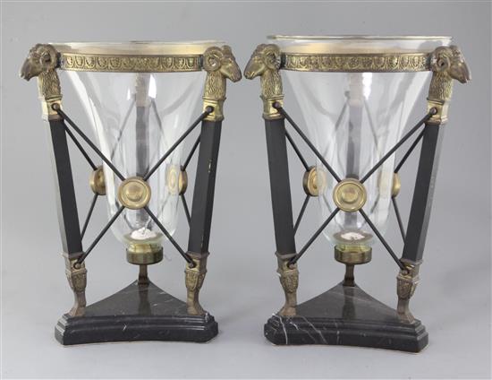 A pair of classical style bronze and marble hurricane lanterns, height 15.25in.